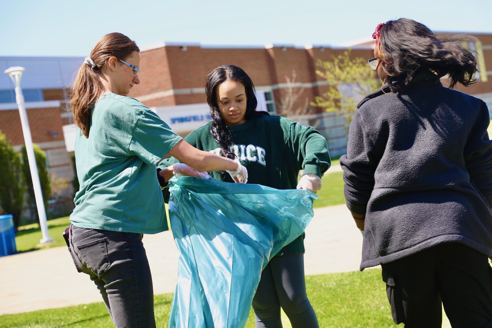 Springfield High School National Honor Society members participated in a beautification effort as their Earth Day observance.