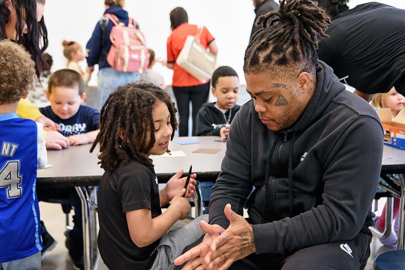 "Mississippi " helps his son, Josh Givens, create a dragon out of clay.