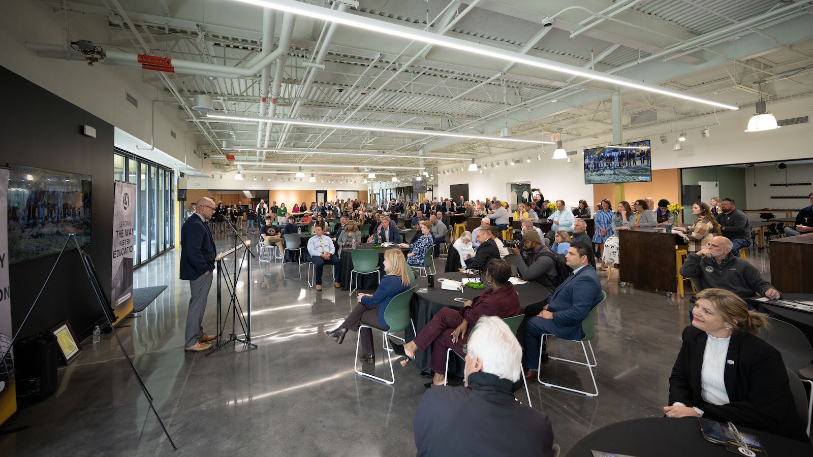 Josh Jennings, founding director of Global Impact Stem Academy addresses the crowd.