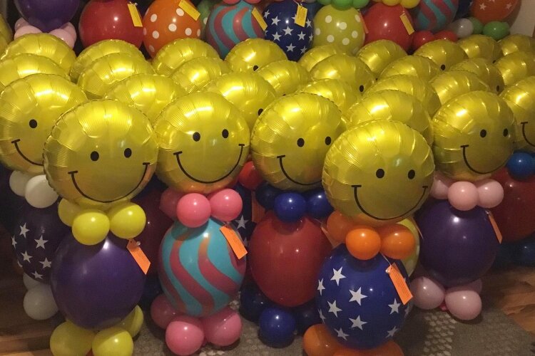 An army of Balloon Buddies wait to be delivered by Yard Balloons To Go to a local nursing care facility.