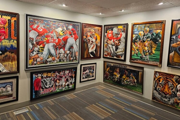 A space filled with sports-themed paintings in the new Gary W. Blevins Art Gallery in Downtown Springfield.
