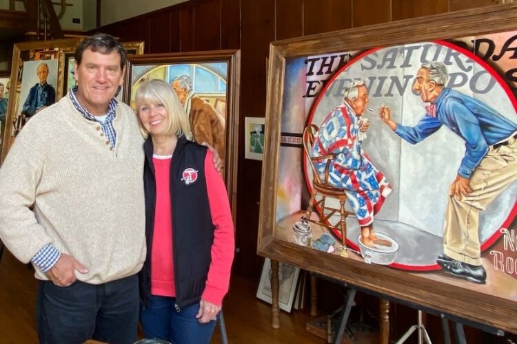 Gary Blevins with some of his hand-painted pieces.