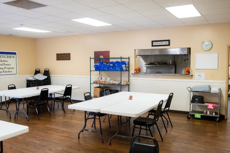 People in need can eat lunch and dinner at Caring Kitchen on weekdays.