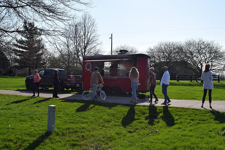 The Painted Pepper food truck serves customers last Friday at Bending Tree Estates. 