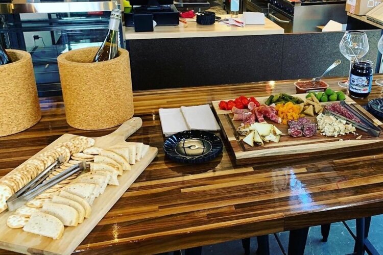 Cork & Board patrons can pick up a variety of wines and charcuterie board options.