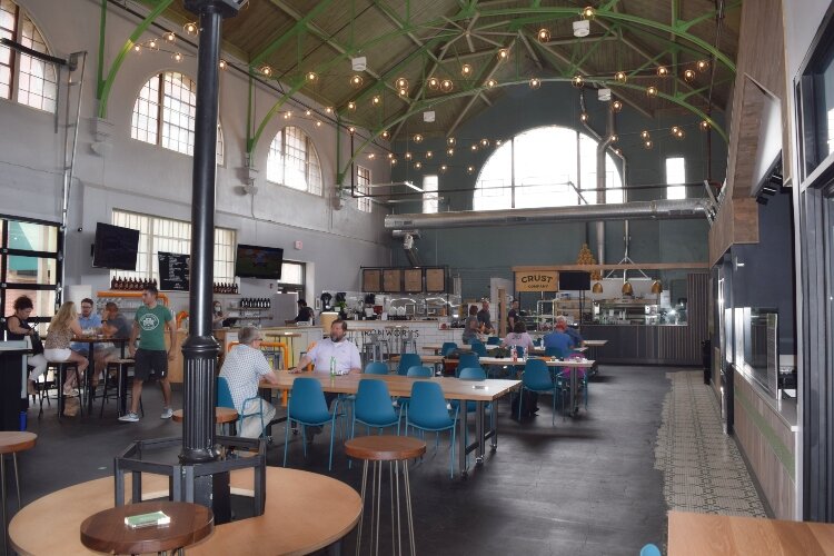 With the bars and restaurants opening inside COhatch, the open indoor space and front patio seating has already been a draw for many customers.
