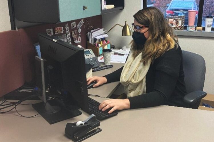 Clark County Combined Health District Health Planning Supervisor Emma Smales works to keep track of new positive COVID-19 cases and complete contact tracing to help curb spread.