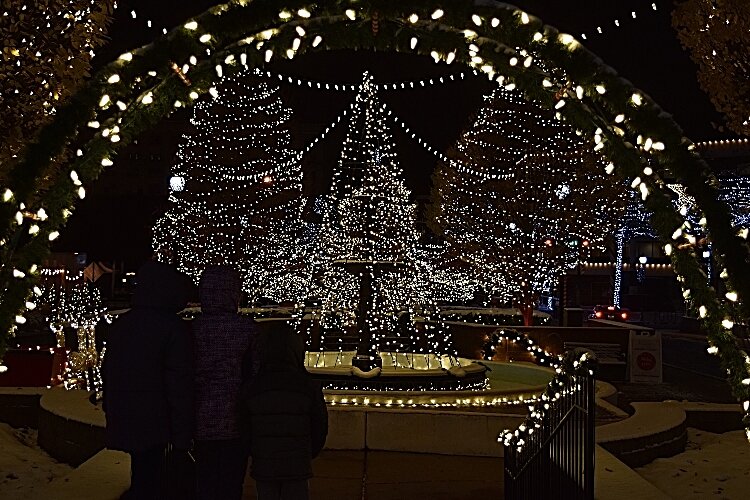 Families have started to take advantage of visiting the new downtown light display in Springfield, both to enjoy the experience and take advantage of photo ops.