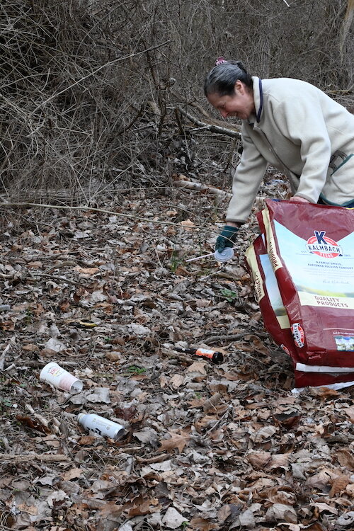 Miracle Mile Hill is a beautiful nature area that deer roam on, says Mary Katherine Somers. "It has become littered and deer now walk on trash, heartbreaking. So I try to keep it litter-free. The bag I am re-using is from a local farmer’s feed, a gre