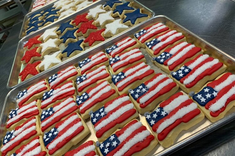 Cutout cookies, like these patriotic flags and stars, are among the many treats ordered from D.Sweets, Cookies & Gifts.