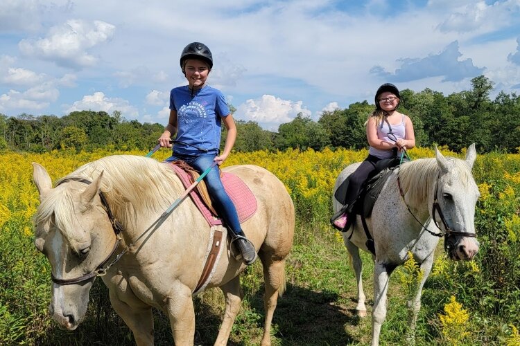 Trail riding is among the offerings at Blue Horseshoe Farm in Clark County.