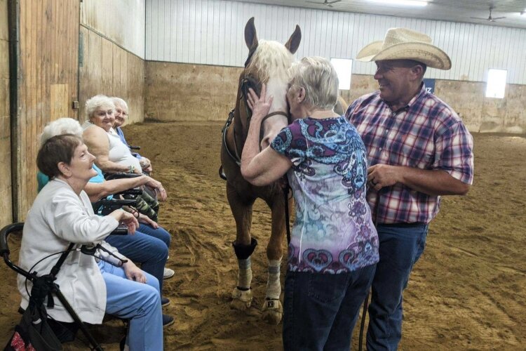 Shawn Flarida (right) and his horses often locally work with students, 4-H members and senior citizens in Clark County.