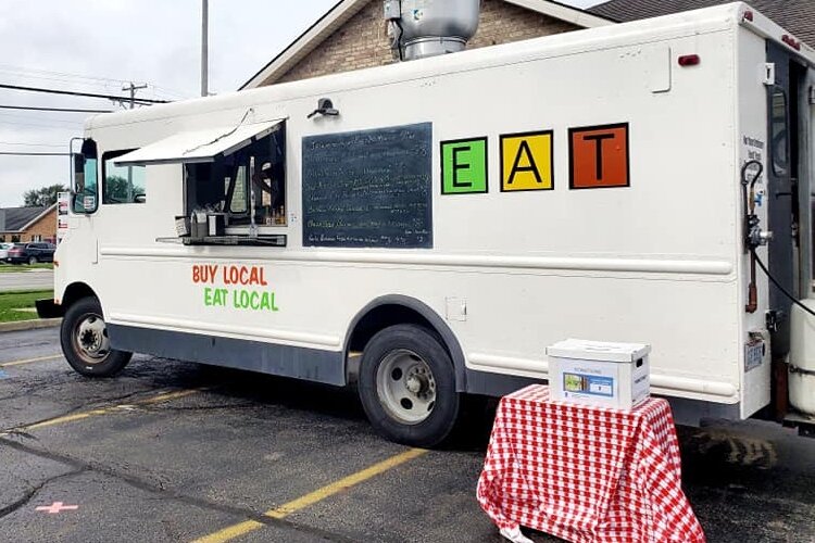 EAT is one of a variety of food trucks scheduled to be at the Real Estate II offices on Home Road every other week as the office promotes and fundraises for rotating local organizations.