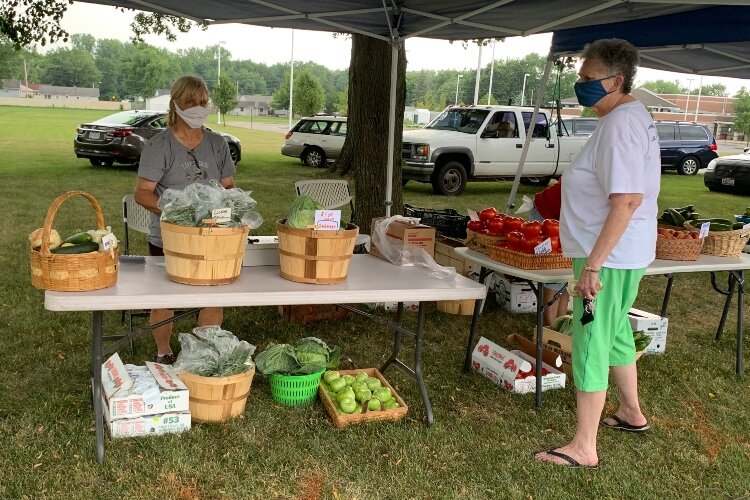 The SOUP farm stand setup at Perrin Woods Elementary School strives to provide fresh produce to neighborhood residents.