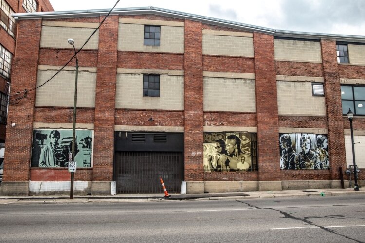 Bricks create picture frames for the new mural installations on the side of Mother Stewart's in downtown Springfield.