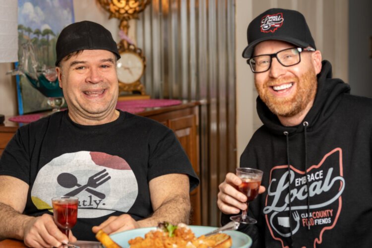Ryan Ray (right) enjoys pasta and sangria with Eatly Owner and Chef Tom Thompson.
