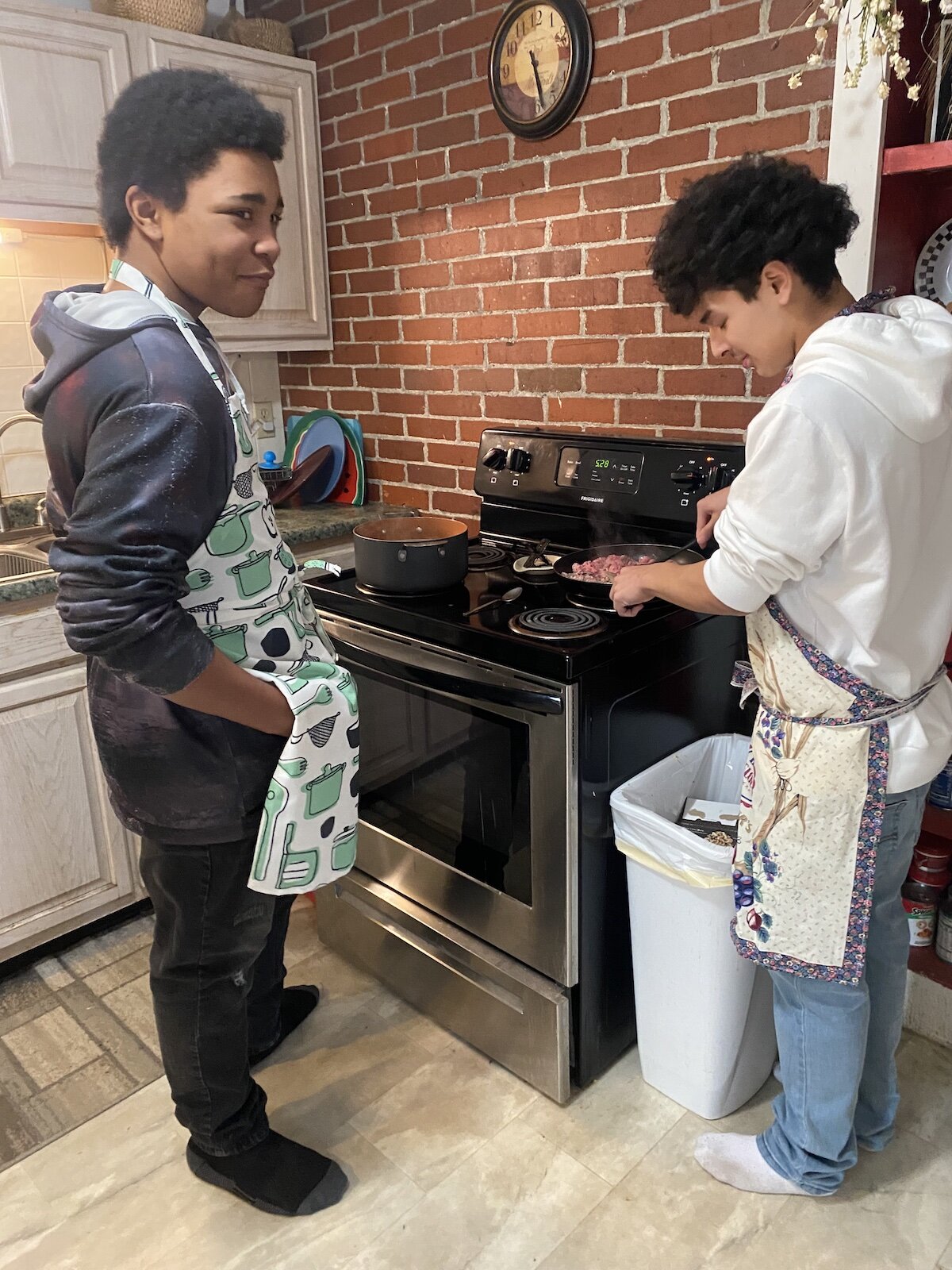 On-The-Rise participants learn skills in the kitchen.