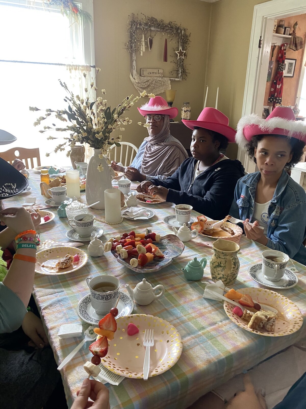 Participants have tea at On-The-Rise.