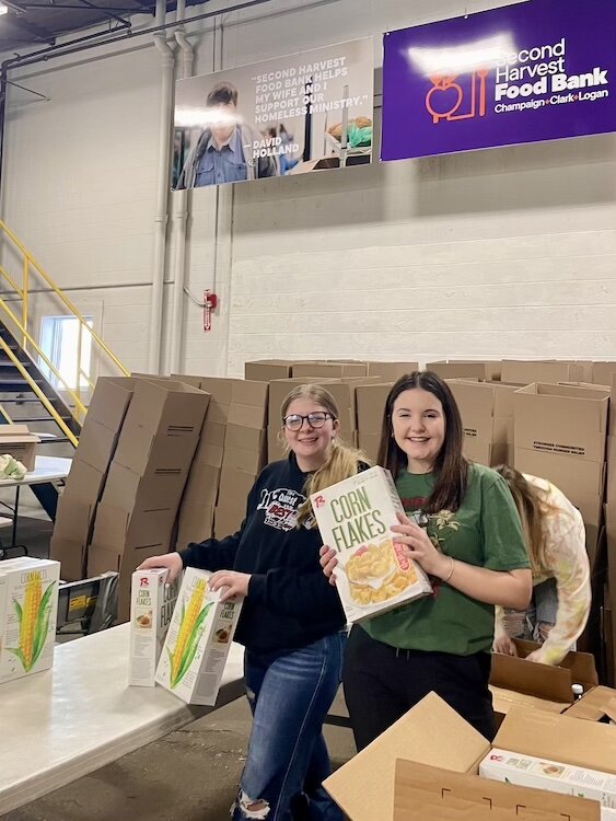 Twenty-three students dedicated their time to pack 200 boxes of food, contributing to the ongoing efforts of Second Harvest in fighting hunger.