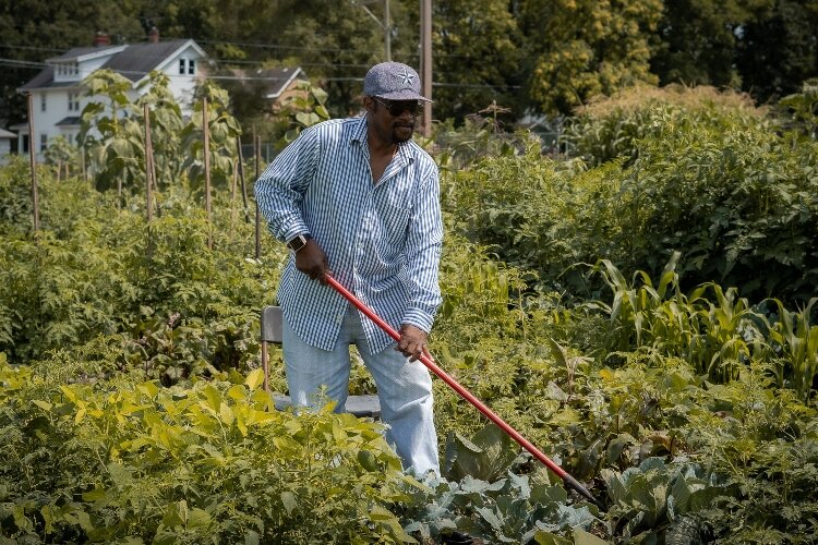 Ronel Muskeyvalley is one of more than 80 local residents who grow fresh produce on plots in the Jefferson Street Oasis Garden.