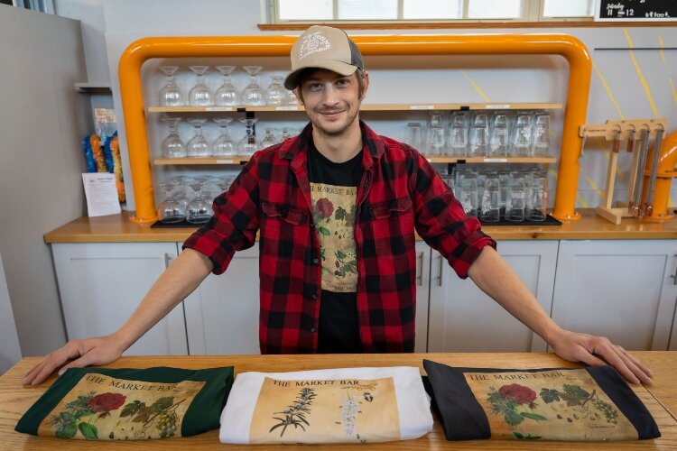 Joel Shear owns Dial-8 Designs, which includes a branch that makes both original and locally-branded T-shirt designs.