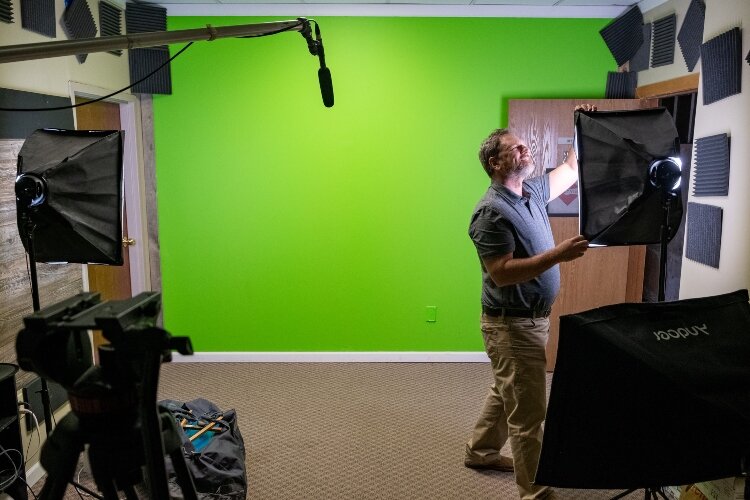 Tony Bailey set up his studio to record Key Vision programming, which is streamed to inmates to help them learn and plan for their release.