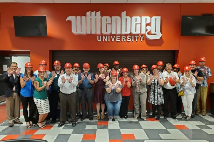 Clark County Leadership members are shown at an event at Wittenberg University. The organization focuses on 'service leadership' to encourage local leaders to be more engaged with community service.