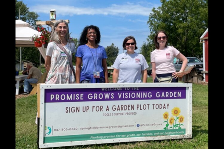 Library staff members Debbie Copeland, Courtney Jones, Sarah Webb and Zoe Spangler at a community event.