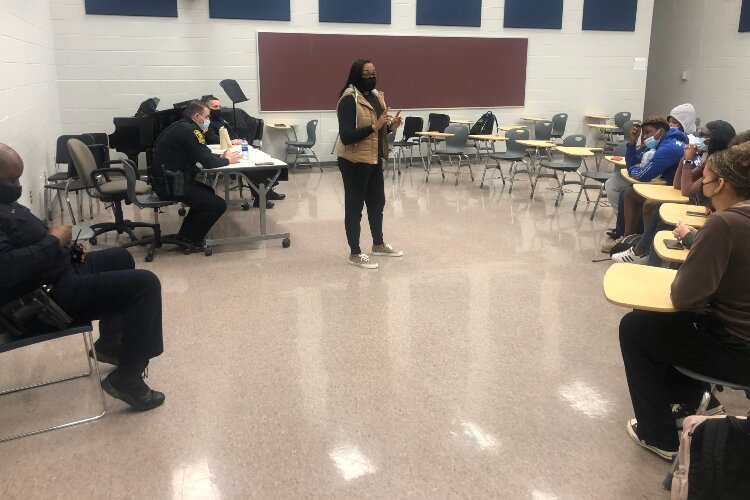 Leaders of Change Founder Lauren Kelley talks with students at Springfield High School before an open discussion organized between the students and Springfield Police Division officers.