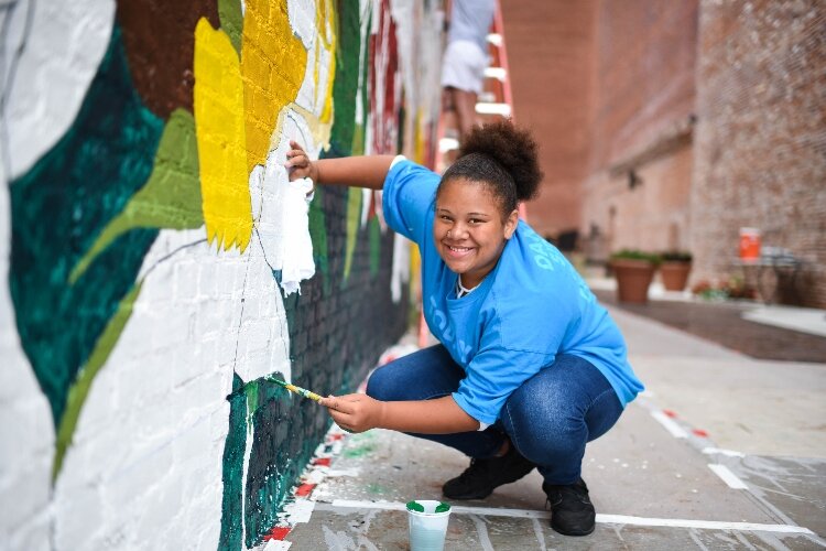 The Rose City mural in downtown Springfield is one of the public art pieces created with the help of a team from Project Jericho.