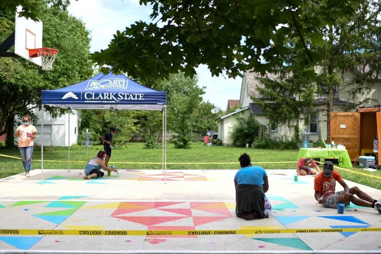 The new mural on Woodward Avenue is being created in a partnership between The Conscious Connect and Project Jericho in the Children's Equity Zone, which also includes a reading park and basketball court.