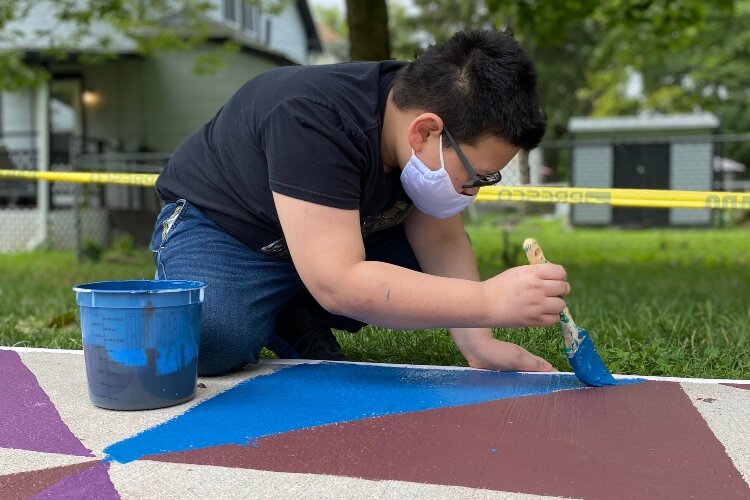 Springfield youth started working in shifts this week to paint a new mural on the South side of Springfield.