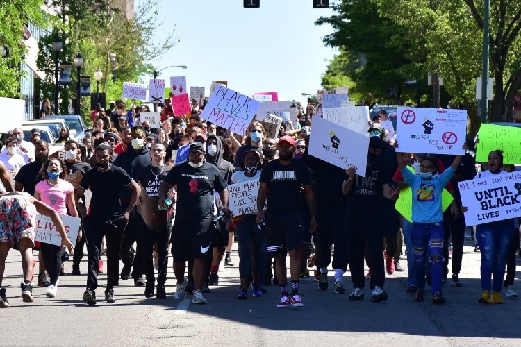 A peaceful protest rallied in Downtown Springfield on Sunday afternoon before marching through the city in response to the recent death of George Floyd.