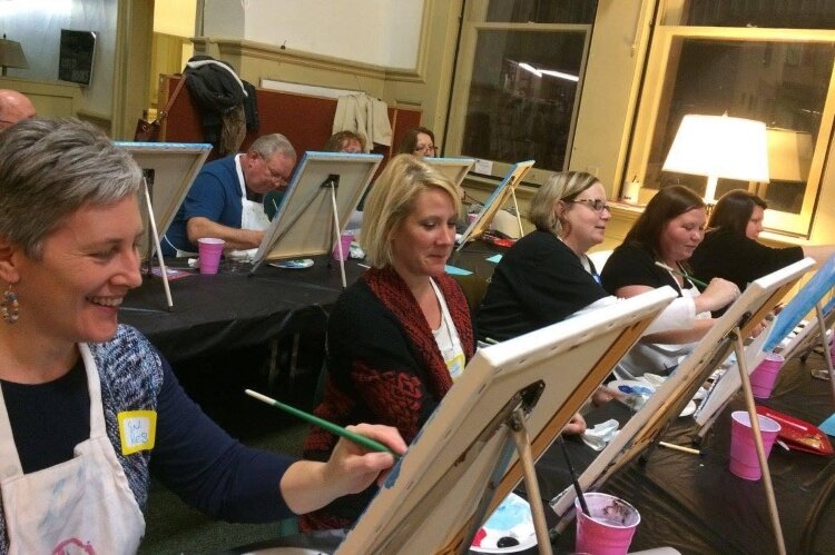 At past fundraisers for Warder Literacy Center, about 50 people would gather at the center to paint a piece with instruction from Sip & Dipity. This year, in-person painters will be socially distanced and a virtual option is available.