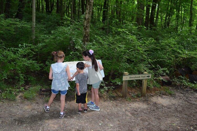 The half-mile Storybook Trail at John Bryan State Park includes pages of a book on markers that kids and families can read as they take a walk.