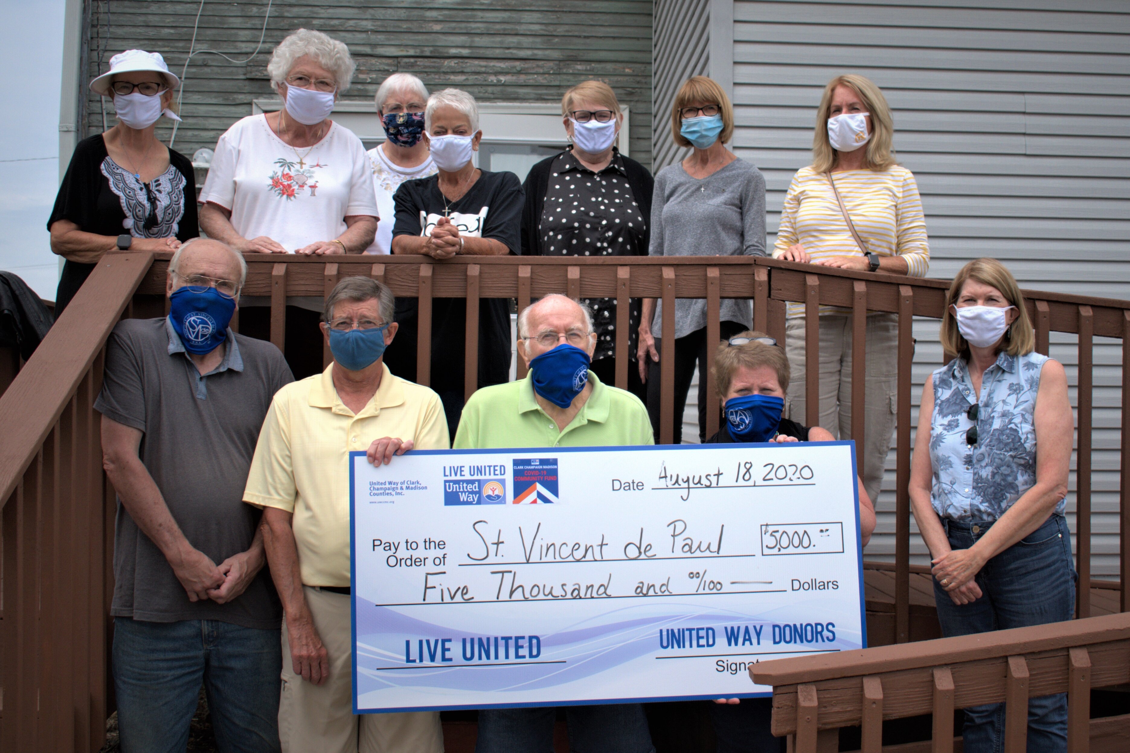 United Way of Clark, Champaign and Madison Counties presented a donation check from its Covid-19 Community Fund to Springfield's St. Vincent de Paul this week.