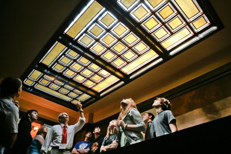 A Westcott House tour showcases the architectural design elements created by Frank Lloyd Wright when the house was built in 1908. (This picture shows a tour from prior to the start of the COVID-19 pandemic).